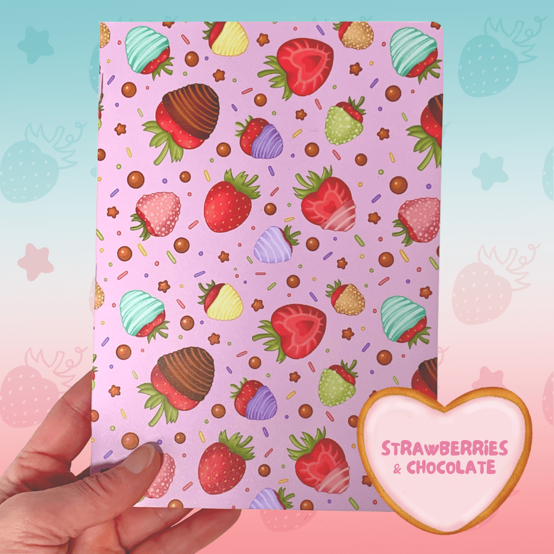 An A5 notebook with strawberries & Chocolate pattern with a pink background.